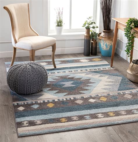 Placing a rug in one area of a large room can help create a more sectioned look that can cause the room to look smaller. . 11x13 area rugs
